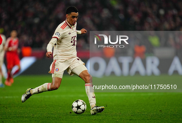 Jamal Musiala of Bayern Munich  controls the ball during the Champions League Round 4 match between Bayern Munich v Benfica at the Allianz a...