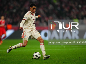 Jamal Musiala of Bayern Munich  controls the ball during the Champions League Round 4 match between Bayern Munich v Benfica at the Allianz a...