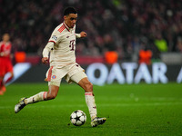 Jamal Musiala of Bayern Munich  controls the ball during the Champions League Round 4 match between Bayern Munich v Benfica at the Allianz a...