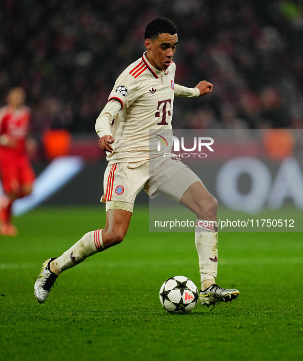 Jamal Musiala of Bayern Munich  controls the ball during the Champions League Round 4 match between Bayern Munich v Benfica at the Allianz a...