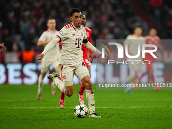 Jamal Musiala of Bayern Munich  controls the ball during the Champions League Round 4 match between Bayern Munich v Benfica at the Allianz a...