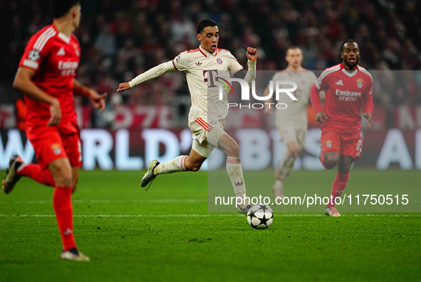 Jamal Musiala of Bayern Munich  controls the ball during the Champions League Round 4 match between Bayern Munich v Benfica at the Allianz a...