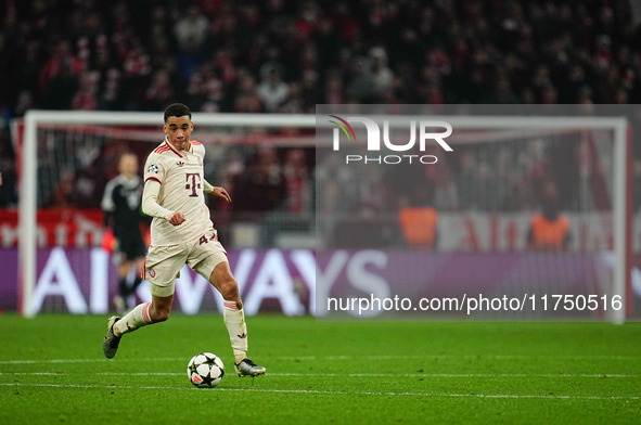 Jamal Musiala of Bayern Munich  controls the ball during the Champions League Round 4 match between Bayern Munich v Benfica at the Allianz a...