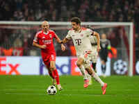 Thomas Muller of Bayern Munich  controls the ball during the Champions League Round 4 match between Bayern Munich v Benfica at the Allianz a...