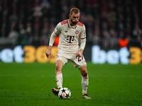 Konrad Laimer of Bayern Munich  controls the ball during the Champions League Round 4 match between Bayern Munich v Benfica at the Allianz a...