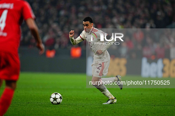 Jamal Musiala of Bayern Munich  controls the ball during the Champions League Round 4 match between Bayern Munich v Benfica at the Allianz a...