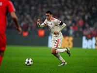 Jamal Musiala of Bayern Munich  controls the ball during the Champions League Round 4 match between Bayern Munich v Benfica at the Allianz a...