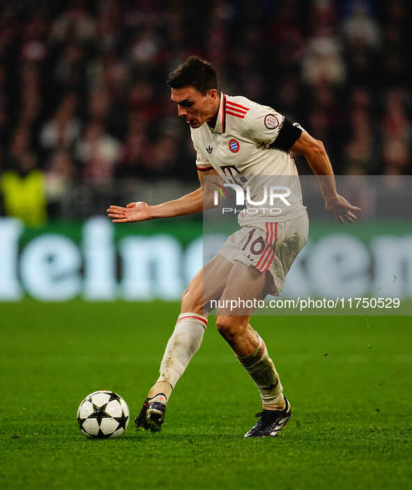 Joao Palhinha of Bayern Munich  controls the ball during the Champions League Round 4 match between Bayern Munich v Benfica at the Allianz a...