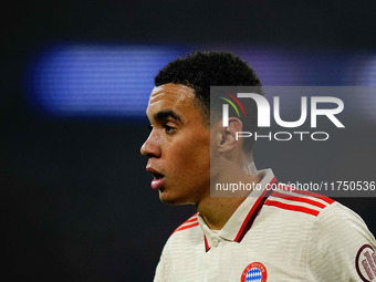 Jamal Musiala of Bayern Munich  looks on during the Champions League Round 4 match between Bayern Munich v Benfica at the Allianz arena, Mun...