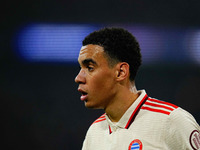 Jamal Musiala of Bayern Munich  looks on during the Champions League Round 4 match between Bayern Munich v Benfica at the Allianz arena, Mun...