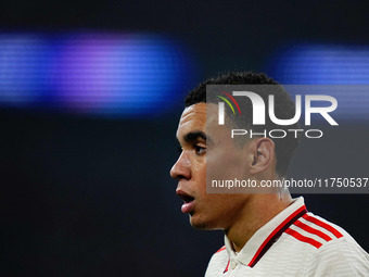 Jamal Musiala of Bayern Munich  looks on during the Champions League Round 4 match between Bayern Munich v Benfica at the Allianz arena, Mun...