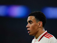 Jamal Musiala of Bayern Munich  looks on during the Champions League Round 4 match between Bayern Munich v Benfica at the Allianz arena, Mun...