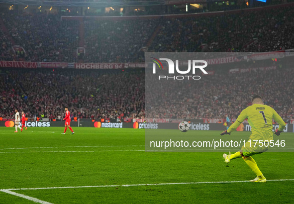 Anatoliy Trubin of Benfica  controls the ball during the Champions League Round 4 match between Bayern Munich v Benfica at the Allianz arena...