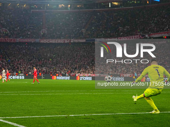 Anatoliy Trubin of Benfica  controls the ball during the Champions League Round 4 match between Bayern Munich v Benfica at the Allianz arena...