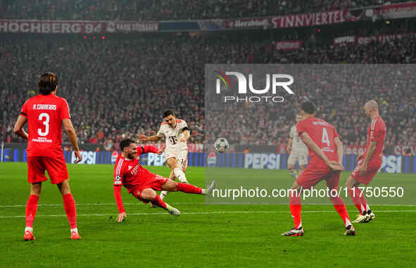 Joao Palhinha of Bayern Munich  shoots on goal during the Champions League Round 4 match between Bayern Munich v Benfica at the Allianz aren...