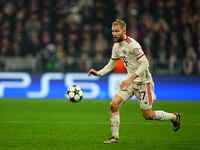 Konrad Laimer of Bayern Munich  controls the ball during the Champions League Round 4 match between Bayern Munich v Benfica at the Allianz a...