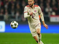 Konrad Laimer of Bayern Munich  controls the ball during the Champions League Round 4 match between Bayern Munich v Benfica at the Allianz a...