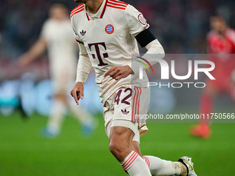 Jamal Musiala of Bayern Munich  looks on during the Champions League Round 4 match between Bayern Munich v Benfica at the Allianz arena, Mun...