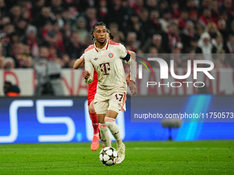 Michael Olise of Bayern Munich  controls the ball during the Champions League Round 4 match between Bayern Munich v Benfica at the Allianz a...