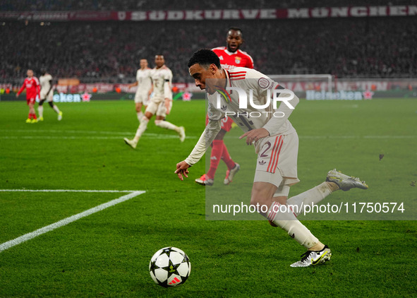 Jamal Musiala of Bayern Munich  controls the ball during the Champions League Round 4 match between Bayern Munich v Benfica at the Allianz a...