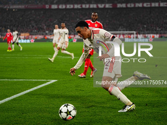 Jamal Musiala of Bayern Munich  controls the ball during the Champions League Round 4 match between Bayern Munich v Benfica at the Allianz a...