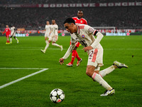 Jamal Musiala of Bayern Munich  controls the ball during the Champions League Round 4 match between Bayern Munich v Benfica at the Allianz a...