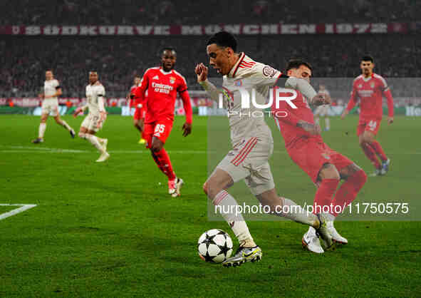 Jamal Musiala of Bayern Munich  controls the ball during the Champions League Round 4 match between Bayern Munich v Benfica at the Allianz a...