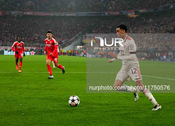 Jamal Musiala of Bayern Munich  controls the ball during the Champions League Round 4 match between Bayern Munich v Benfica at the Allianz a...