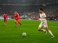 Jamal Musiala of Bayern Munich  controls the ball during the Champions League Round 4 match between Bayern Munich v Benfica at the Allianz a...