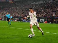 Jamal Musiala of Bayern Munich  controls the ball during the Champions League Round 4 match between Bayern Munich v Benfica at the Allianz a...