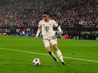 Jamal Musiala of Bayern Munich  controls the ball during the Champions League Round 4 match between Bayern Munich v Benfica at the Allianz a...