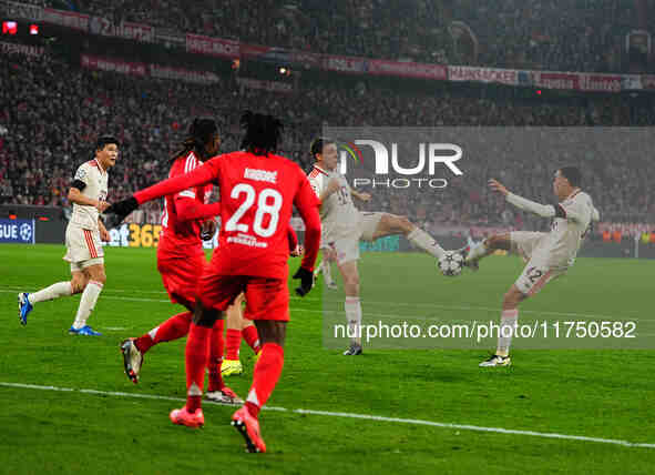 Jamal Musiala of Bayern Munich  shoots on goal during the Champions League Round 4 match between Bayern Munich v Benfica at the Allianz aren...