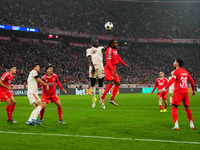 Dayot Upamecano of Bayern Munich  heads during the Champions League Round 4 match between Bayern Munich v Benfica at the Allianz arena, Muni...