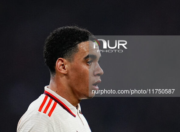 Jamal Musiala of Bayern Munich  looks on during the Champions League Round 4 match between Bayern Munich v Benfica at the Allianz arena, Mun...