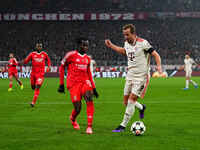 Harry Kane of Bayern Munich  controls the ball during the Champions League Round 4 match between Bayern Munich v Benfica at the Allianz aren...