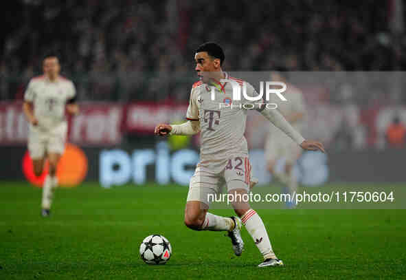 Jamal Musiala of Bayern Munich  controls the ball during the Champions League Round 4 match between Bayern Munich v Benfica at the Allianz a...