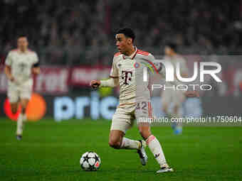 Jamal Musiala of Bayern Munich  controls the ball during the Champions League Round 4 match between Bayern Munich v Benfica at the Allianz a...