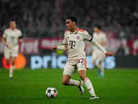 Jamal Musiala of Bayern Munich  controls the ball during the Champions League Round 4 match between Bayern Munich v Benfica at the Allianz a...