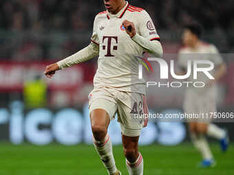 Jamal Musiala of Bayern Munich  controls the ball during the Champions League Round 4 match between Bayern Munich v Benfica at the Allianz a...