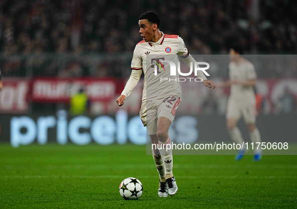 Jamal Musiala of Bayern Munich  controls the ball during the Champions League Round 4 match between Bayern Munich v Benfica at the Allianz a...