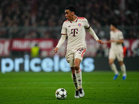 Jamal Musiala of Bayern Munich  controls the ball during the Champions League Round 4 match between Bayern Munich v Benfica at the Allianz a...