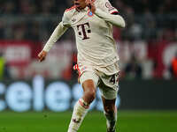 Jamal Musiala of Bayern Munich  controls the ball during the Champions League Round 4 match between Bayern Munich v Benfica at the Allianz a...