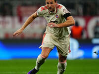 Harry Kane of Bayern Munich  controls the ball during the Champions League Round 4 match between Bayern Munich v Benfica at the Allianz aren...