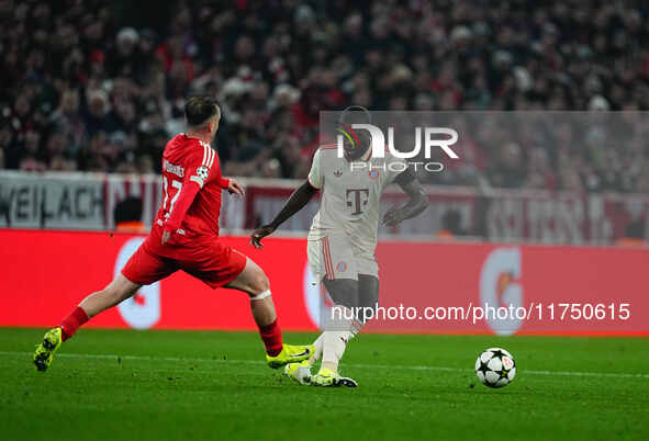 Dayot Upamecano of Bayern Munich  controls the ball during the Champions League Round 4 match between Bayern Munich v Benfica at the Allianz...