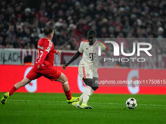 Dayot Upamecano of Bayern Munich  controls the ball during the Champions League Round 4 match between Bayern Munich v Benfica at the Allianz...