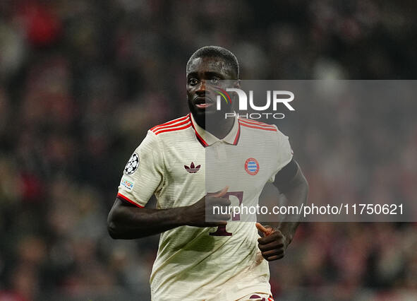 Dayot Upamecano of Bayern Munich  looks on during the Champions League Round 4 match between Bayern Munich v Benfica at the Allianz arena, M...