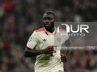 Dayot Upamecano of Bayern Munich  looks on during the Champions League Round 4 match between Bayern Munich v Benfica at the Allianz arena, M...