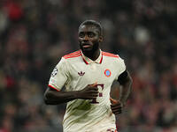 Dayot Upamecano of Bayern Munich  looks on during the Champions League Round 4 match between Bayern Munich v Benfica at the Allianz arena, M...