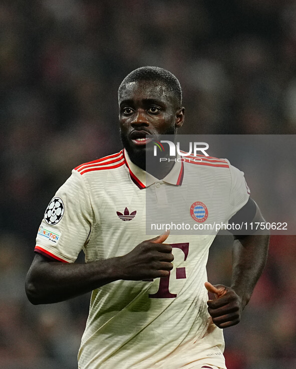 Dayot Upamecano of Bayern Munich  looks on during the Champions League Round 4 match between Bayern Munich v Benfica at the Allianz arena, M...