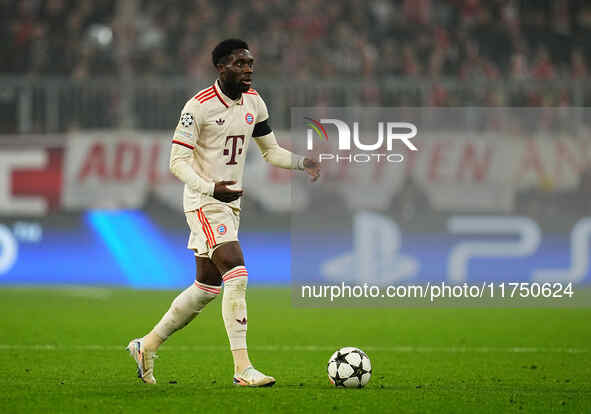 Alphonso Davies of Bayern Munich  controls the ball during the Champions League Round 4 match between Bayern Munich v Benfica at the Allianz...